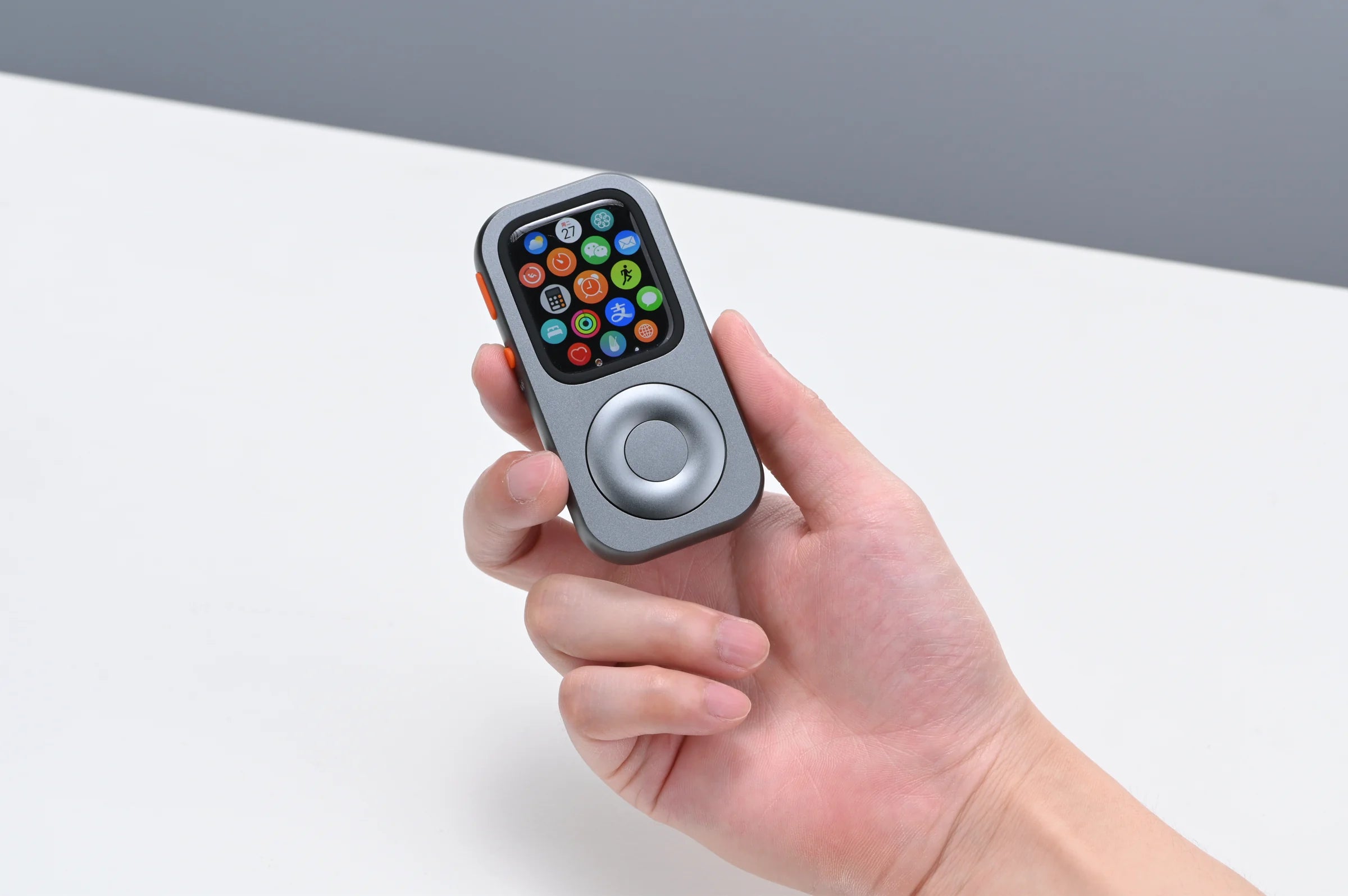RePod held at a three-quarter angle with the standard Apple Watch app grid visible