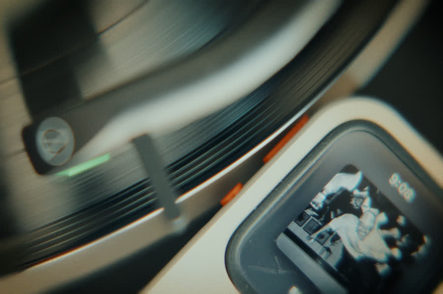 Front-facing RePod C1 with music artwork visible on Apple Watch