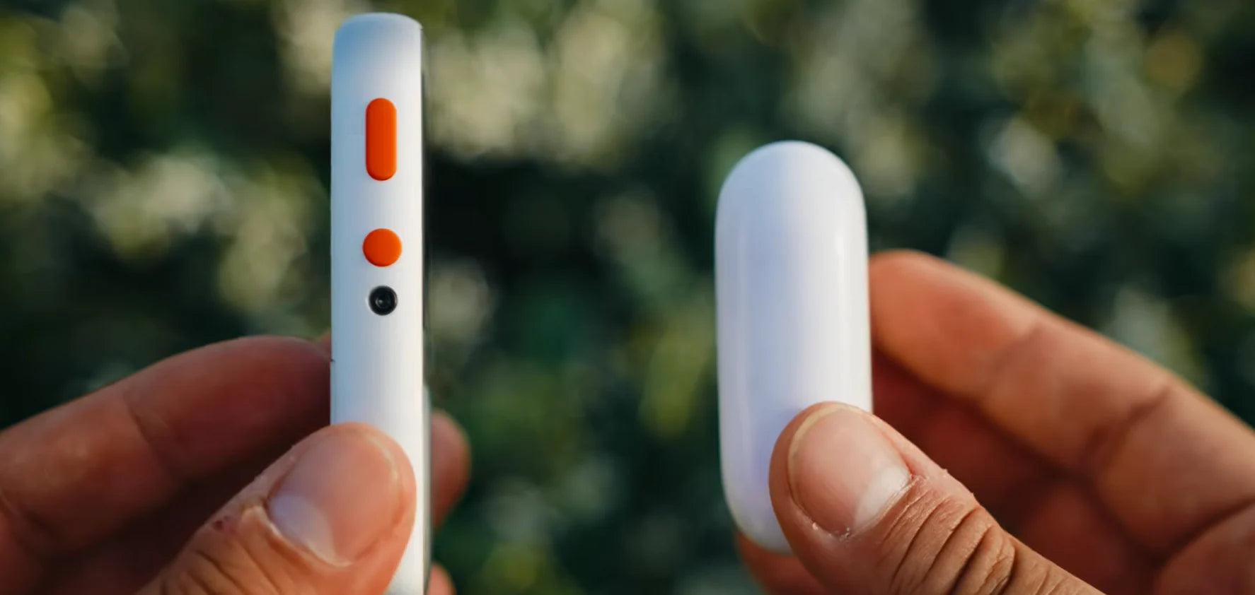 Close side view of RePod with two orange Apple Watch controls visible